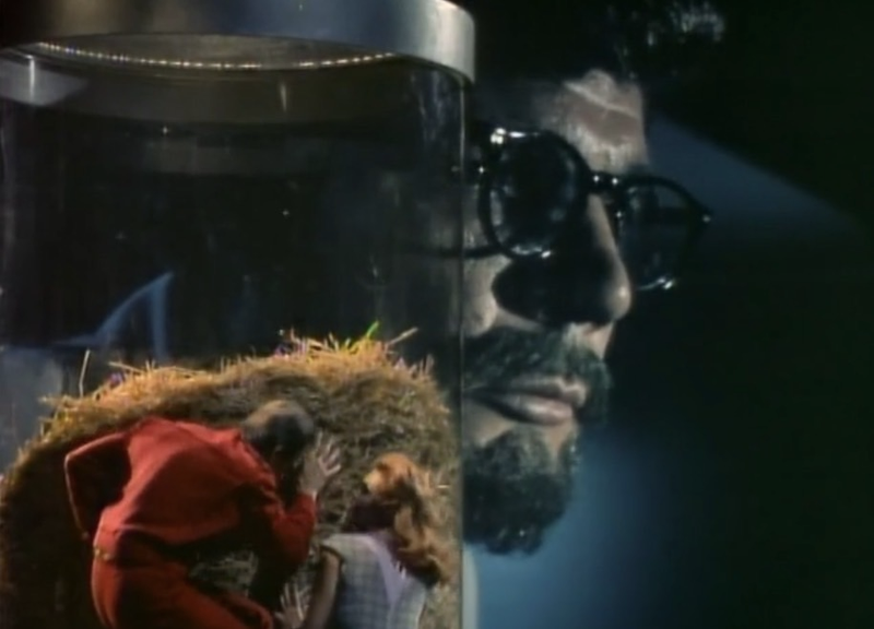 Two “six-inch oddities” hide from a mega-sized human in the first episode of Land of the Giants.